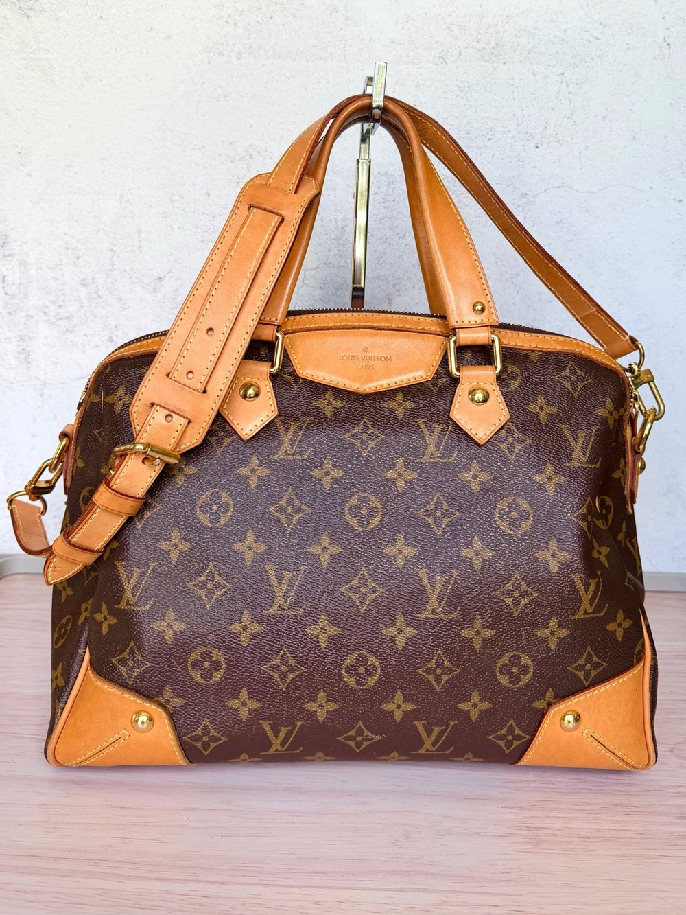 Louis Vuitton Retiro PM canvas monogram with beautiful leather patina.